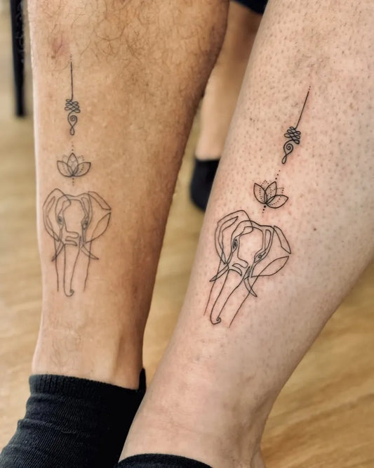 Small Abstract One Line Elephant Lotus Tattoo on Men Leg by @bnanatattoo