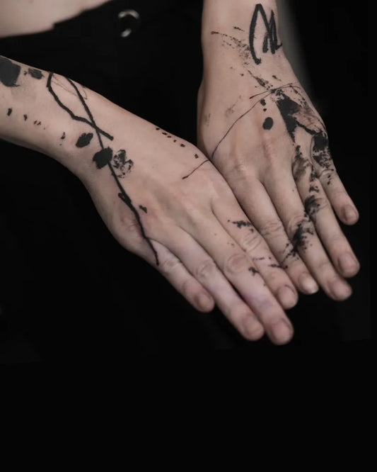 Small Abstract Splatter Branches Tattoo on Women Wrists by @tattooer_nadi