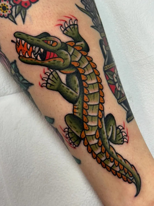 Small American Traditional Alligator on Women Arm Tattoo by @corycraft
