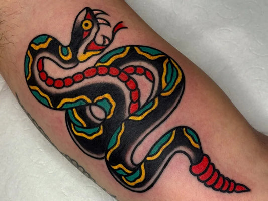 Small American Traditional Cobra Snake on Men Arm Tattoo by @camilokreep