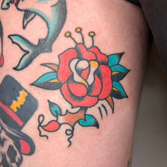 Small American Traditional Shark Rose Top Hat on Men Arm Tattoo by @markus.farewell