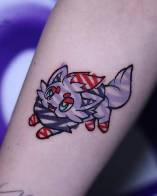 Small Anime Pokemon Zorua Tattoo on Women Arm by @honeyblt
