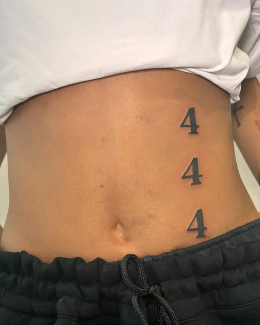 Small Black and Grey 444 on Women Abdomen Tattoo by @inkedbybleuu