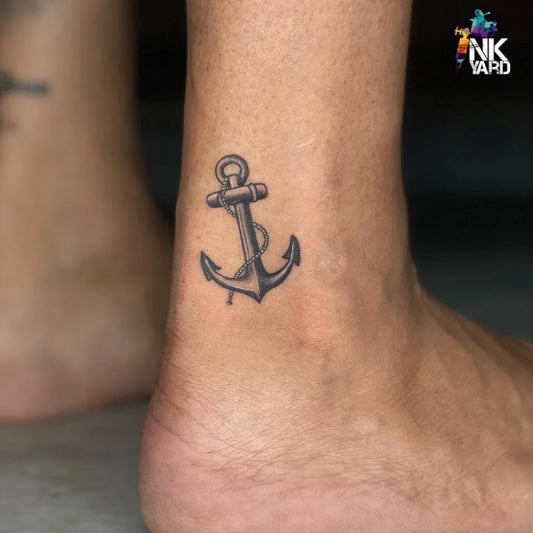 Small Black and Grey Anchor Tattoo on Men Ankle by @the.coretattoo