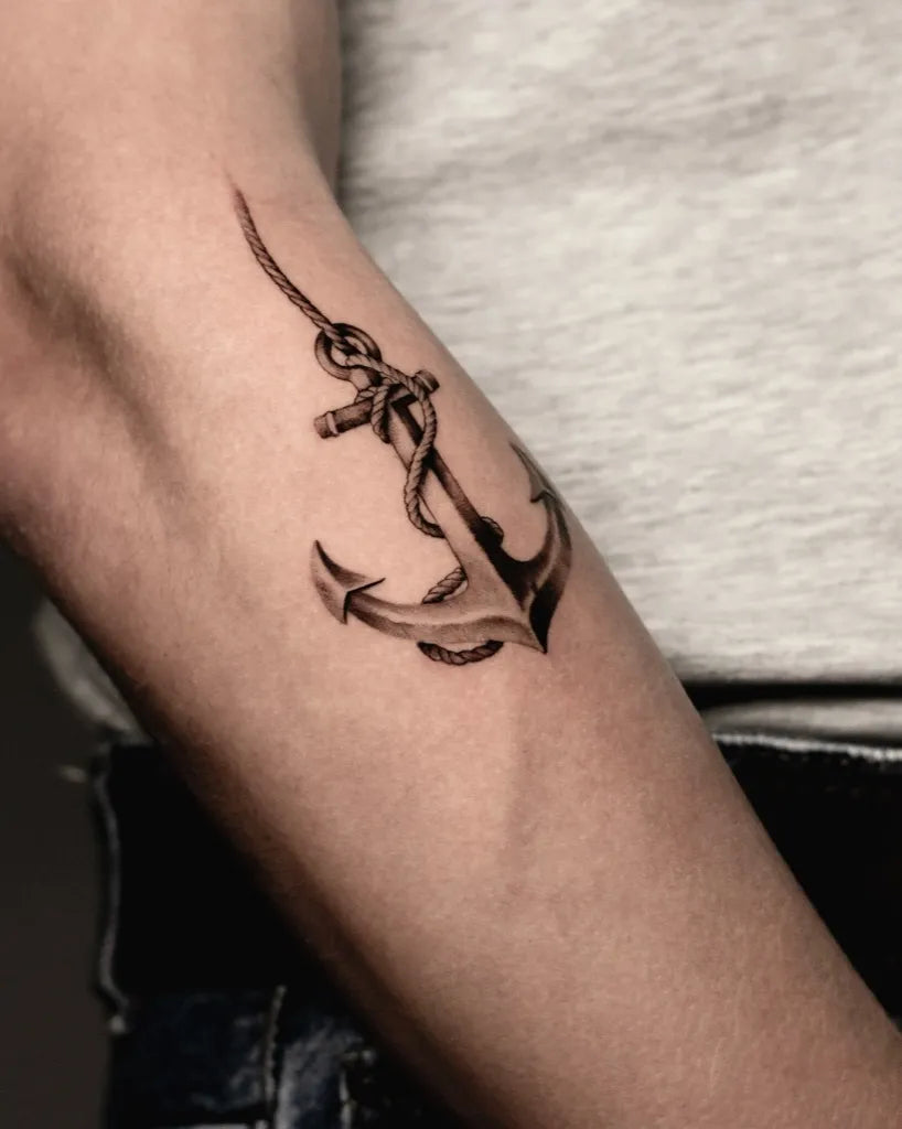 Small Black and Grey Anchor Tattoo on Men Arm by @lbink_