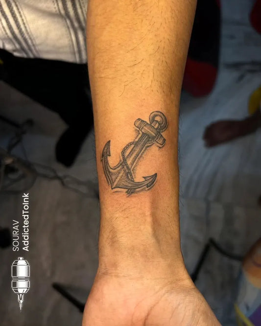 Small Black and Grey Anchor Tattoo on Men Wrist by @addic.tedtoink