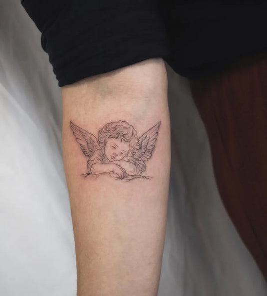 Small Black and Grey Angel on Women Arm Tattoo by @malau_blackdrop