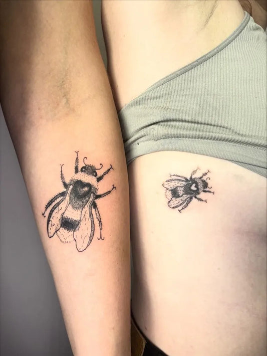 Small Black and Grey Bee on Women Arm Tattoo by @florannan