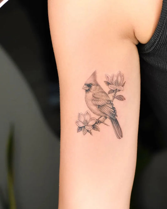 Small Black and Grey Cardinal and Flowers Tattoo on Women Arm by @bryan