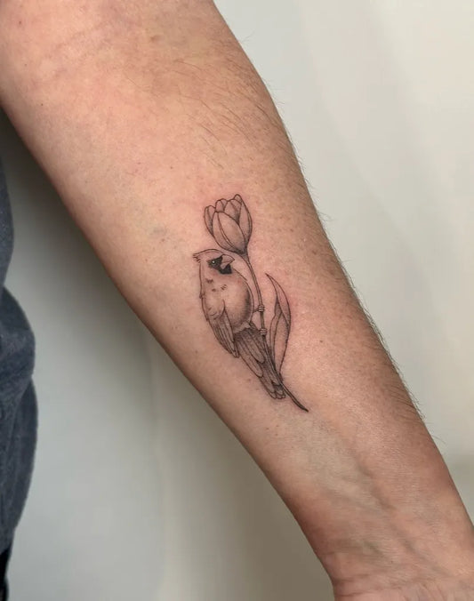 Small Black and Grey Cardinal and Tulip Tattoo on Women Forearm by @perreault.productions