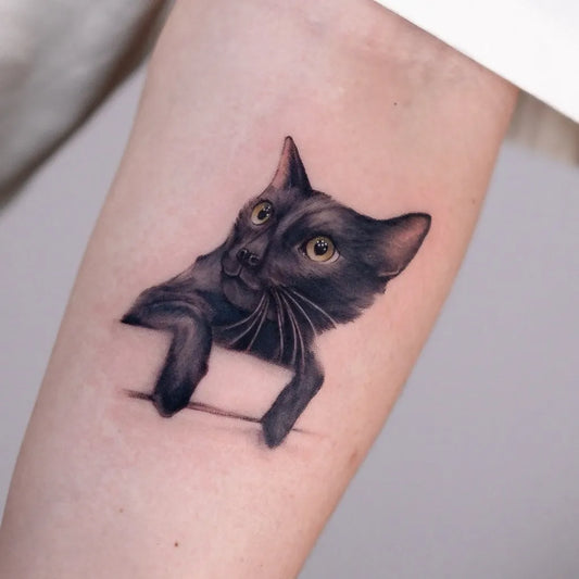 Small Black and Grey Cat Tattoo on Women Arm by @inkkoela