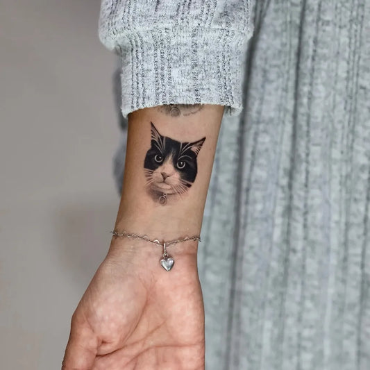 Small Black and Grey Cat Tattoo on Women Forearm by @julianpettattoo