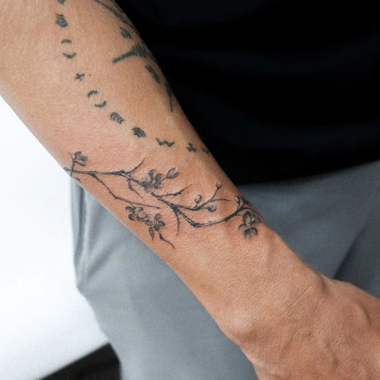 Small Black and Grey Cherry Blossom Branch on Men Arm Tattoo by @tattooer_nina