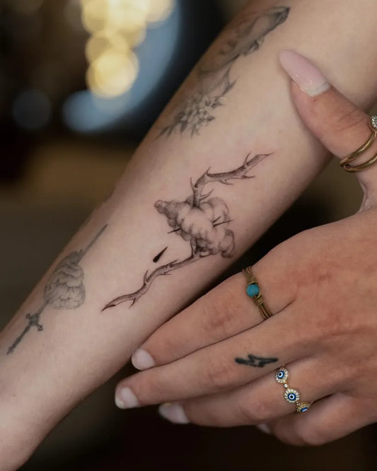 Small Black and Grey Cloud and Deer Tattoo on Women Arm by @mickey.ontheclouds