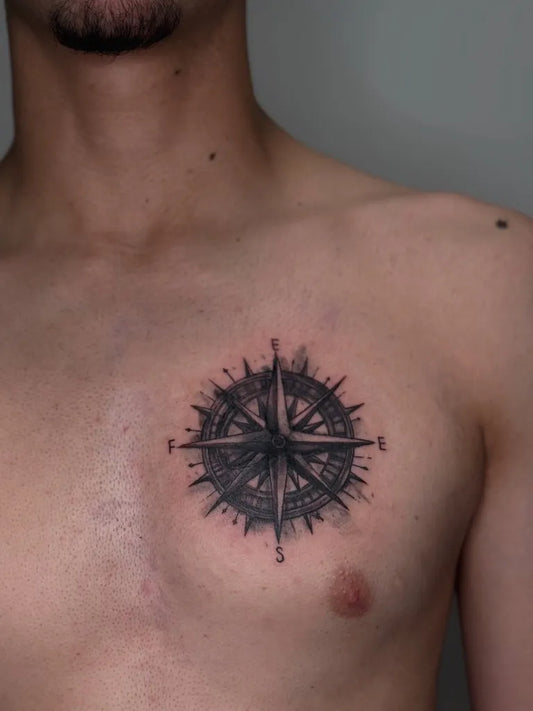 Small Black and Grey Compass on Men Chest Tattoo by @sherytattooer