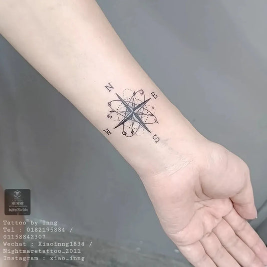 Small Black and Grey Compass on Women Wrist Tattoo by @xiao_inng