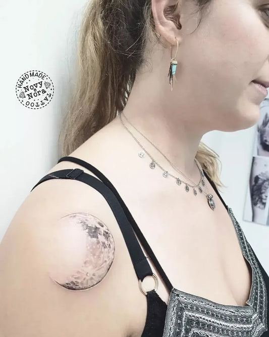 Small Black and Grey Crescent Moon Tattoo on Women Shoulder by @novytattoo_handmade_studio