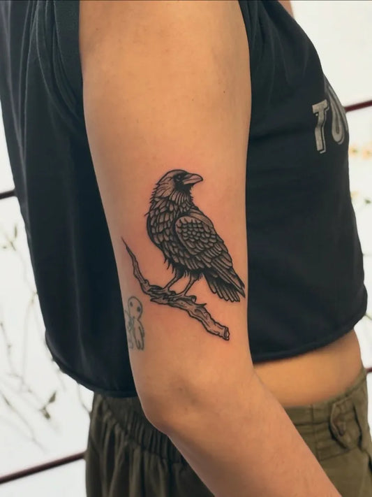 Small Black and Grey Crow on Branch Tattoo on Women Arm by @artof_cj