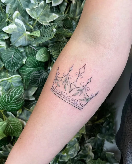 Small Black and Grey Crown Tattoo on Women Arm by @deabeantattoos