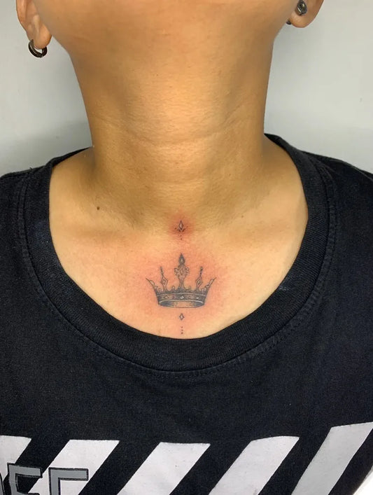 Small Black and Grey Crown Tattoo on Women Neck by @da_moon_____
