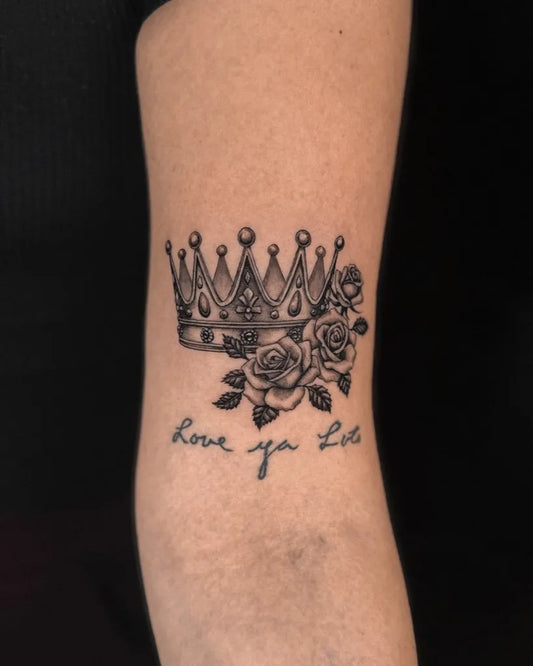 Small Black and Grey Crown and Roses Tattoo on Women Arm by @vic.ink_
