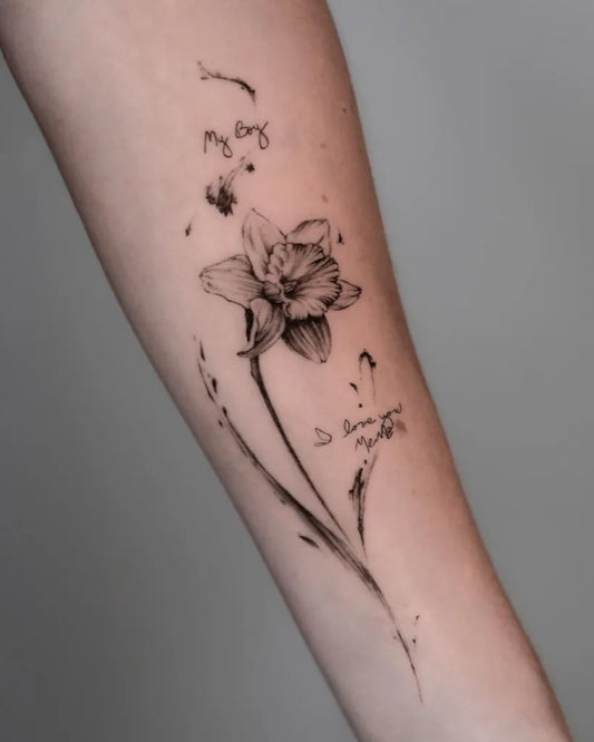 Small Black and Grey Daffodil and Script Tattoo on Women Arm by @joyk_lights
