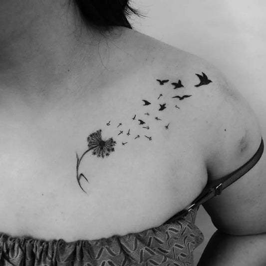 Small Black and Grey Dandelion and Birds Tattoo on Women Shoulder by @sabbysstudio