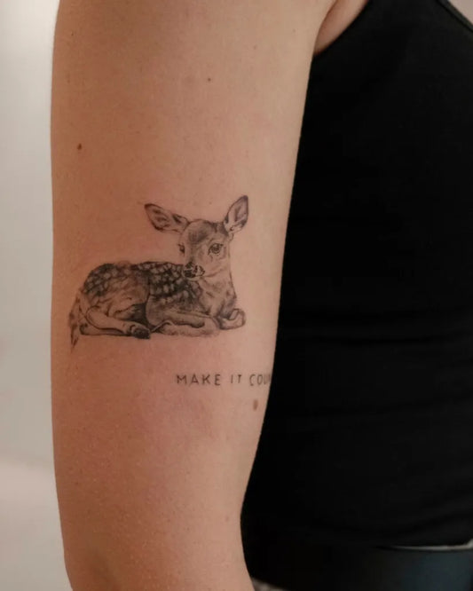 Small Black and Grey Deer Tattoo on Women Arm by @tattsbysophie