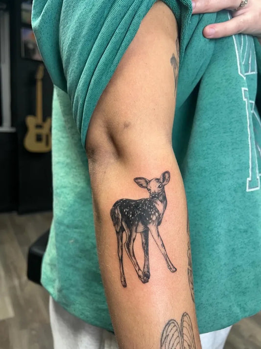 Small Black and Grey Deer Tattoo on Women Arm by @touchofgreybydannie