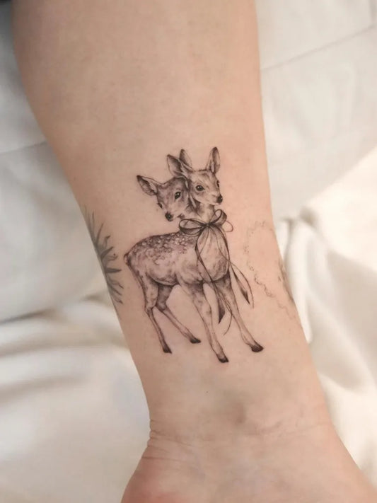 Small Black and Grey Deer Tattoo on Women Leg by @fairies.and.goblins