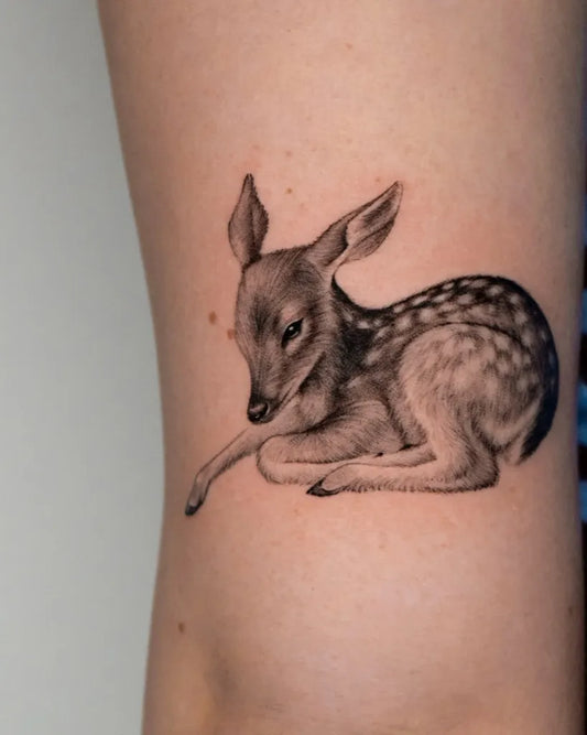 Small Black and Grey Deer Tattoo on Women Leg by @majestixink