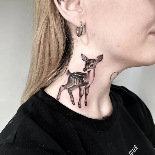 Small Black and Grey Deer Tattoo on Women Neck by @badmoodmarty