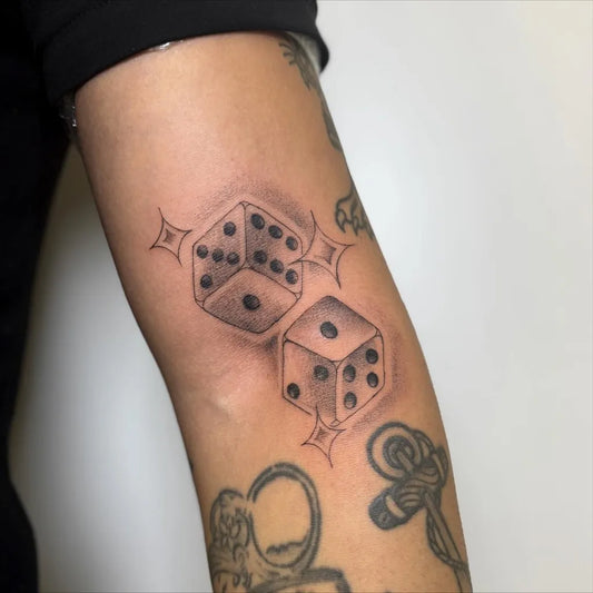Small Black and Grey Dice Tattoo on Men Arm by @claralinfa