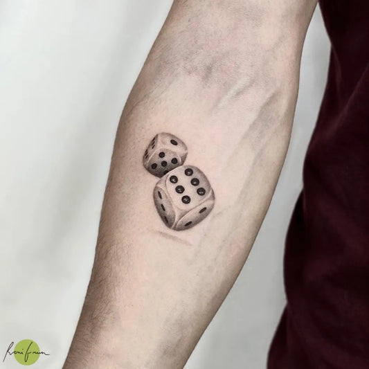 Small Black and Grey Dice Tattoo on Men Arm by @roni.tattoos