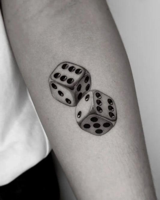 Small Black and Grey Dice Tattoo on Women Arm by @__tzl.aho