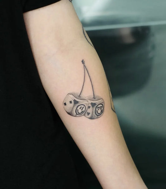 Small Black and Grey Dice Tattoo on Women Arm by @lonewolf_studio