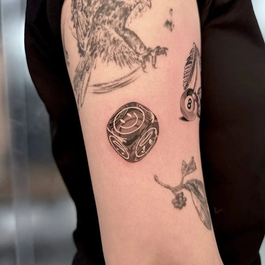 Small Black and Grey Dice and Eagle Tattoo on Women Arm by @yeontaan