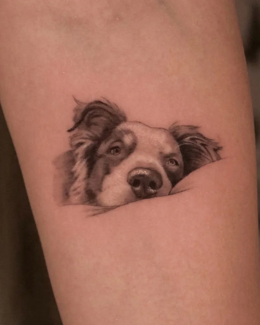 Small Black and Grey Dog Tattoo on Women Arm by @nickthetailor