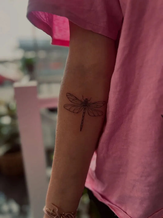 Small Black and Grey Dragonfly on Women Arm Tattoo by @rottencandy_ink