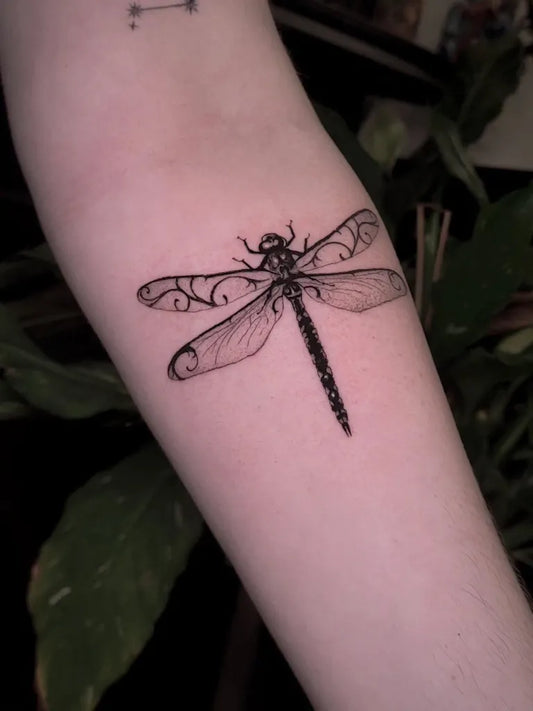 Small Black and Grey Dragonfly on Women Forearm Tattoo by @doomqueentattoo