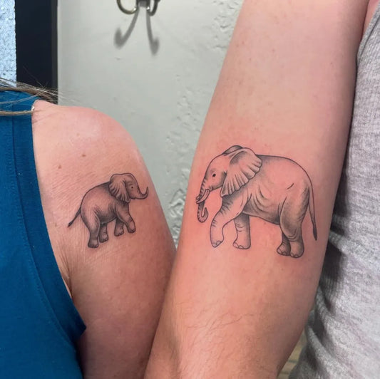 Small Matching Elephant Tattoo on Women Shoulder by @badtoadboy