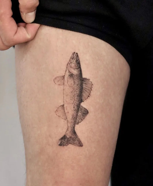 Small Black and Grey Fish Tattoo on Men Thigh by @ondo.tattoo