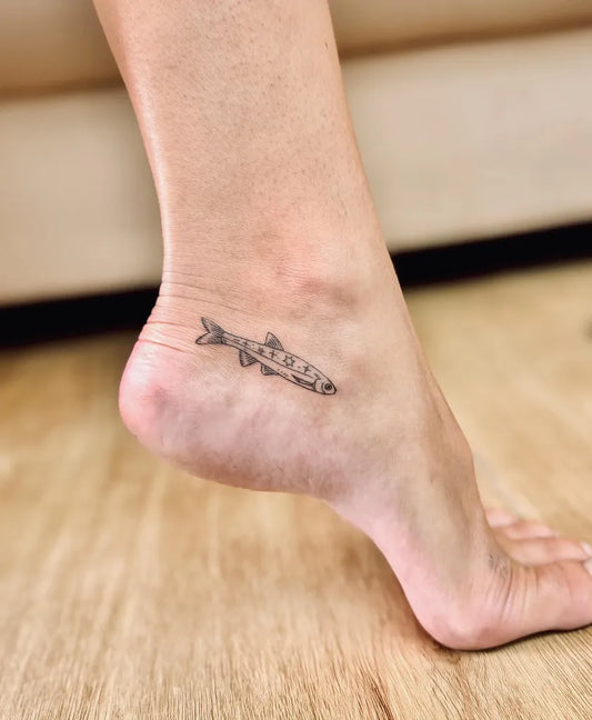 Small Black and Grey Fish Tattoo on Women Foot by @bnanatattoo
