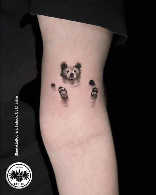 Small Black and Grey Floating Bear on Women Arm Tattoo by @blueinktat2