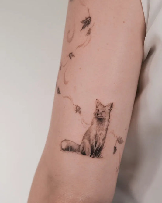 Small Black and Grey Fox and Leaves Tattoo on Women Arm by @yummy
