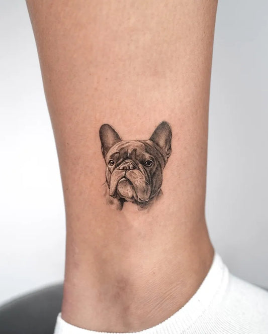 Small Black and Grey French Bulldog Tattoo on Women Ankle by @tattooist_eheon
