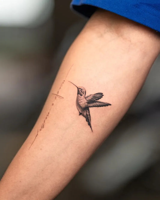 Small Black and Grey Hummingbird and Cross on Women Arm Tattoo by @tatu_panda
