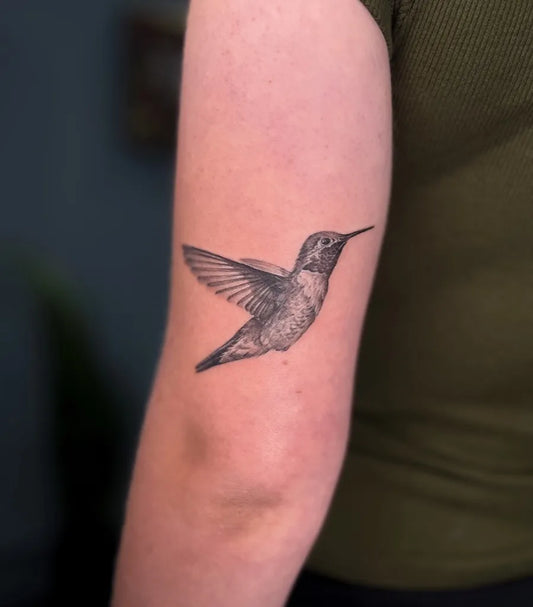 Small Black and Grey Hummingbird on Women Arm Tattoo by @_lilit_tattoo