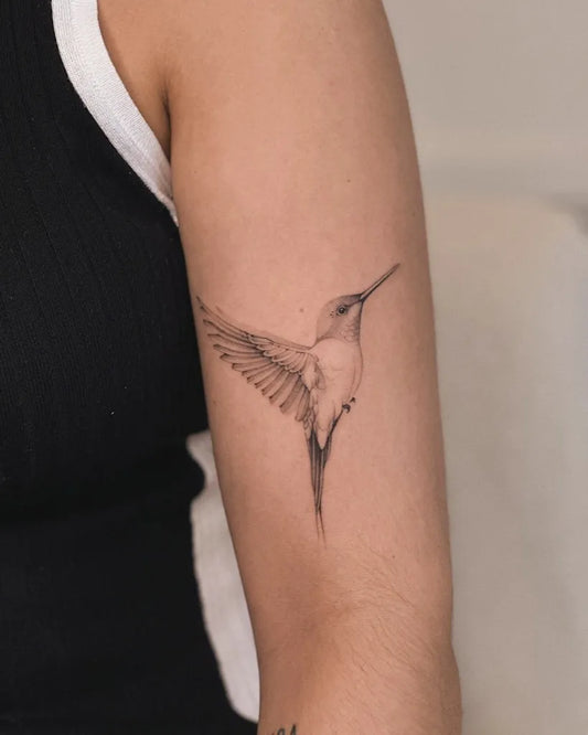 Small Black and Grey Hummingbird on Women Arm Tattoo by @vinicioslira