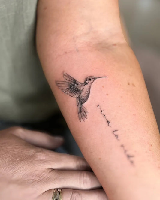 Small Black and Grey Hummingbird with VivalaVida Text on Women Arm Tattoo by @sammii.ink
